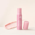 CureRox PDRN Collagen Volume Multi Balm stick, upright with cap removed beside a balm swatch
