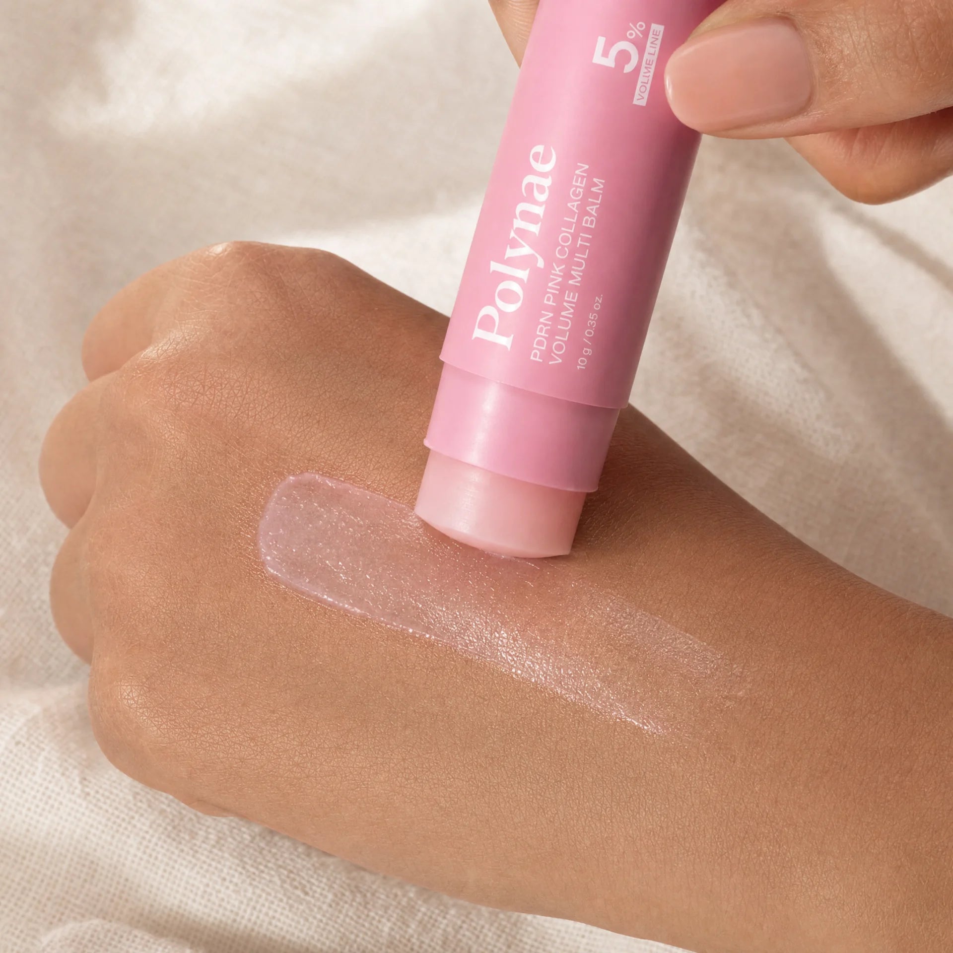 CureRox balm texture swatch on back of hand